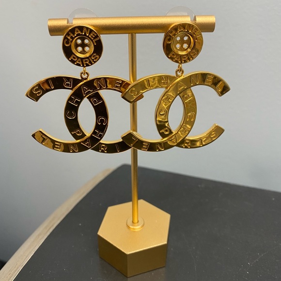 CHANEL Jewelry - Chanel Button Gold Embossed CC Dangle Drop Earrings. New with box and case.
